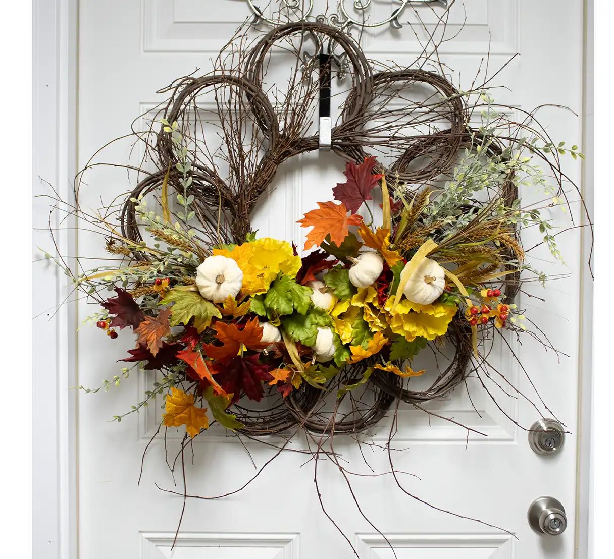 This wreath’s sophisticated design makes it an ideal addition to your fall decor. Perfect for a front door or an indoor wall, it captures the essence of autumn’s warmth and bounty, welcoming guests with a festive and timeless charm.